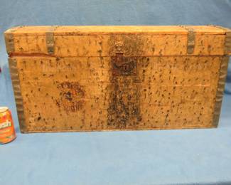 Lot 21. Dome top immigrant trunk dated 1884. 32" x 16" x 16.5". Original handles and lock. No key.