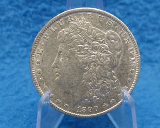 Lot 306. 1890 P Morgan silver dollar