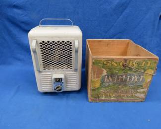 Lot 162. Vintage wooden fruit box and an electric heater that powers up