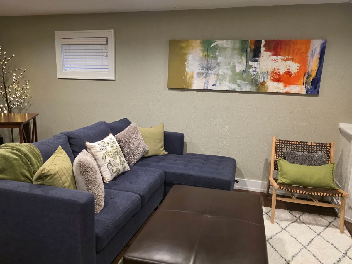 Everything in this photo is for sale. The lounge part of the couch opens up.