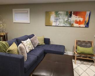 Everything in this photo is for sale. The lounge part of the couch opens up.