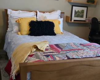 Bed frame with headboard.  Bedding not included