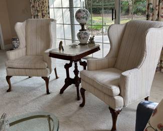 Pair of vintage upholstered wingback chairs
