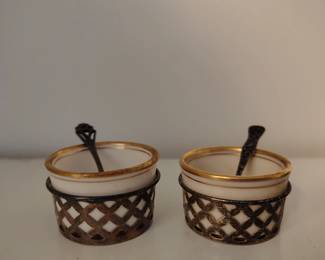 Antique Lenox sterling and porcelain cellars with sterling silver spoons .