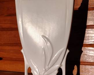 Large white antique roseville pottery vase .