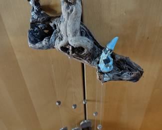 Artist made wizard and dragon wind chime.