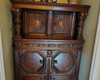 Antique Jacobean  carved wood cupboard  (very nice piece).