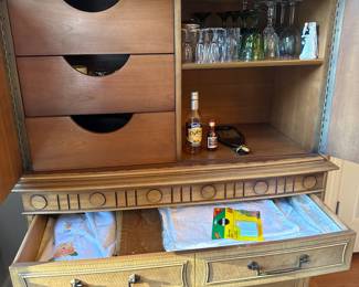 That is a Mid-Century Cocktail Cabinet / Liquor
Armoire circa 1955-1960