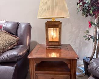 solid end table
wood “lantern” table lamp with a glass window box base traditional empire/pleated shade on top.