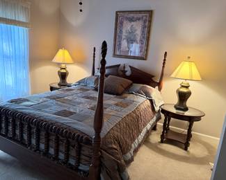 Queen Bed, Glass top side tables Brass Matching lamps fringed satin Spread with matching shams