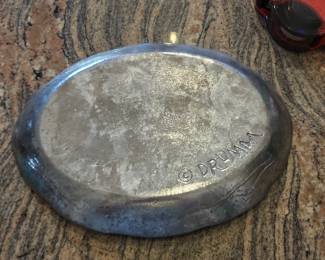 Signature on the back of the platter.