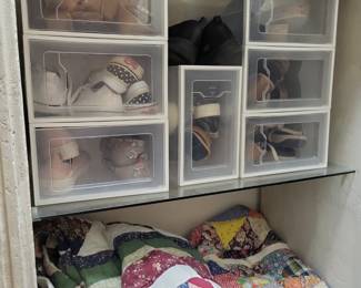 Assorted shoes and quilts.