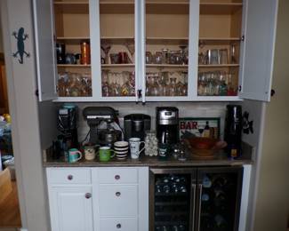 Kitchen appliances. Various cups and mugs.