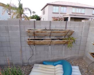 2-tier wall haning planters with elephant bush plants.