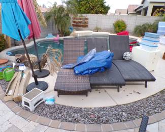 3 pool lounge chairs. Umbrellas
