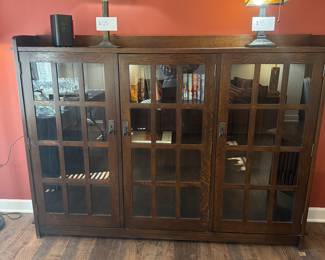 Stickley cabinet with Tiffany style lamps