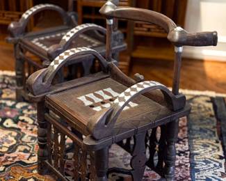 Antique, hand-carved African chief chairs from the Ivory Coast (two available - priced individually)
