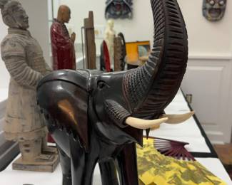 25” Chinese Hand-Carved Solid Ebony Wood Elephant Statue with Raised Trunk - Mid-Late 20th Century