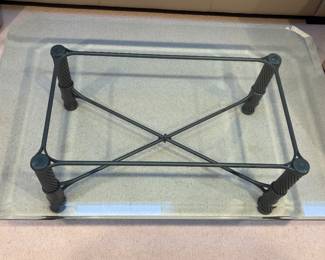 Heavy rectangular, beveled, glass, and metal coffee table