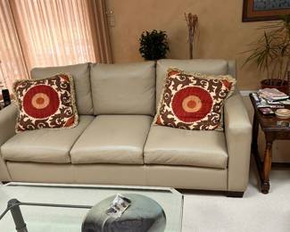 Beautiful leather sofa with matching Ottomans
