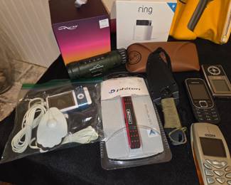 TENS Unit; Ray Ban sun glasses