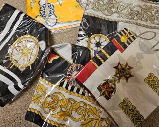 a very large selection of wonderful scarves in sild, cotton featuring all kinds of designs