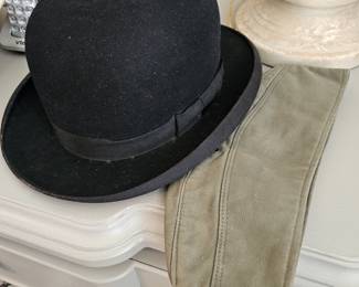 British bowler hat and vintage army cap