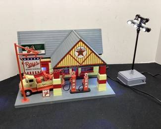 Lighted house gas station