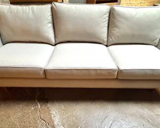 Minimalist Vintage Sofa with Wide Arms and Tailored Cushions