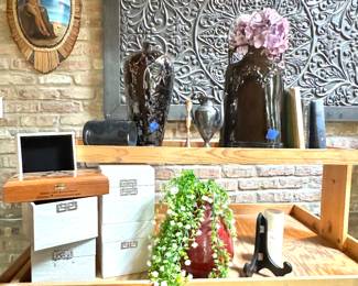 Rustic Wood Console Table with Decorative Wall Art and Vases