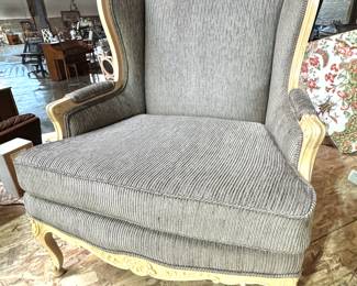 Wingback Armchair with Ornate Carved Wood and Upholstery
