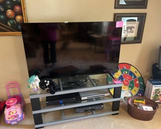 Flat screen TV and stand