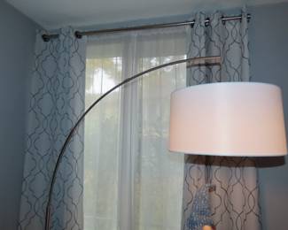 Chrome base floor lamp.