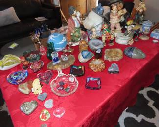 Tables of glass, collectibles, clowns, crystal, geodes and more.