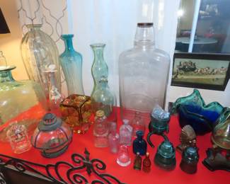 Large glass bottles, Depression glass, medicine bottles, vases and antique insulators.