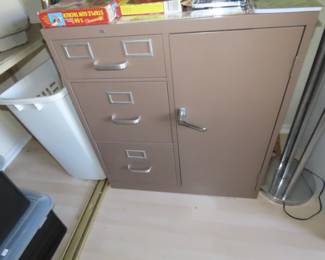 Metal filing cabinet and shelves.