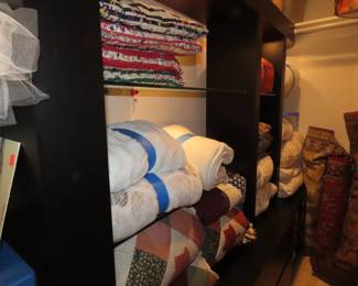 Comforters, blankets and pillows.