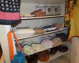 Linens and storage baskets.