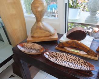 Large wooden decoys and other wood figures.