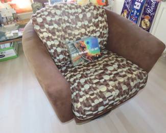 One swivel club chair.