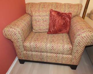 One of two over sized armchairs.