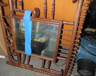 Spindle mirror and wall hat stand.