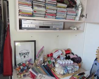 Sewing notions and CDs.