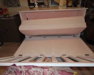 Murphy bed in cabinet.