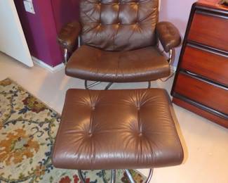 Mid century pushback recliner and footstool., chrome/stainless base.