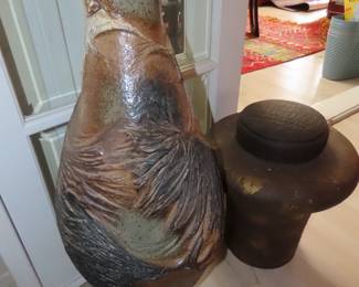 Large ceramic vase and obelisk.