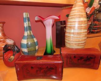 Chinese wooden pillows, art glass vase, and cermic vases.