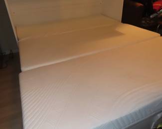 Murphy bed in cabinet.