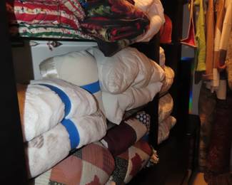 Pillows, blankets, comforters and rugs.