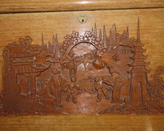 Asian themed hand carved drop down writing desk and chair.